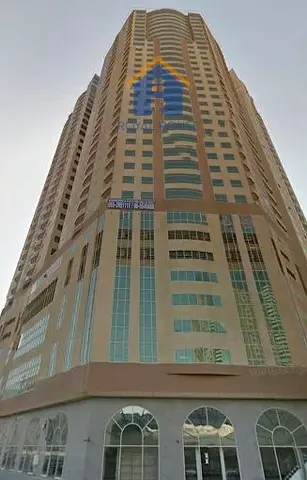 One-bedroom apartment with a living room and parking space for sale in Al Nahda.