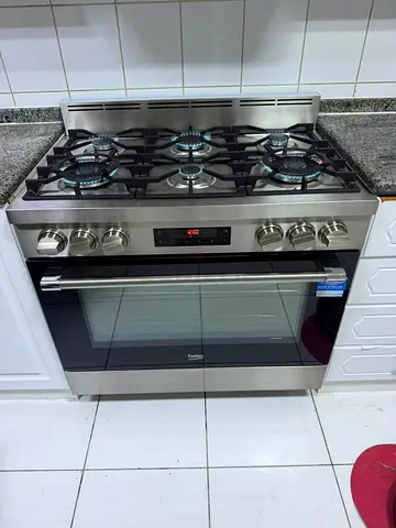 Beko 90 cm top gass oven electric range new model slightly used with 6 burnr gass stove