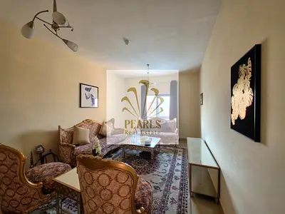 🏢 Furnished 2-bedroom apartment for annual rent in Nuaimiya Tower C, Ajman. Spacious living room, 3 bathrooms and flexible payment in 4 installments.