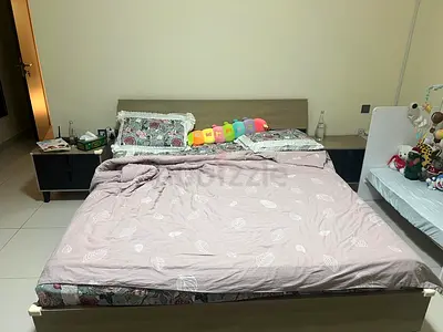 Wooden bed frame with headboard and side tables and mattress - good condition