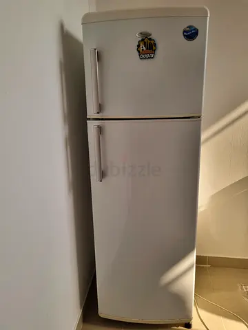White double-door refrigerator (fridge + freezer) - good working condition