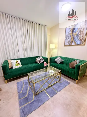 Furnished apartment in Al Qasimia, Sharjah, featuring a bedroom, living room, kitchen, and bathroom. The unit is furnished to a "super deluxe.