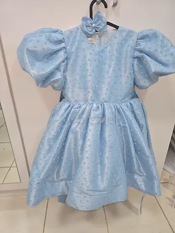Light blue puff-sleeve girls’ party dress, size for an 8-year-old. Perfect, brand new; worn for only