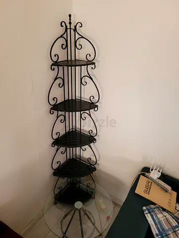 Set of tall black wrought iron corner shelving unit - 5 tiers and round glass table