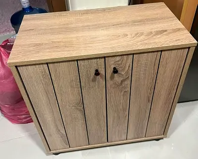 Light oak wooden cabinet/shelf unit with multiple compartments