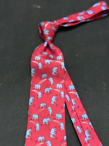 HERMES Red Silk Tie with Light Blue Elephant Pattern