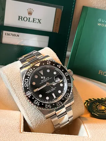 Rolex GMT 116710 LN green arrow year 2017 box and papers.