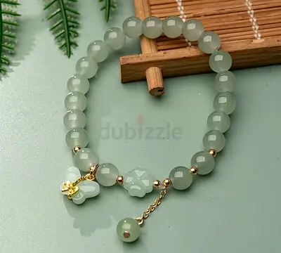 Green Jade Beaded Bracelet with Gold Charms - Elegant Stretch Bracelet