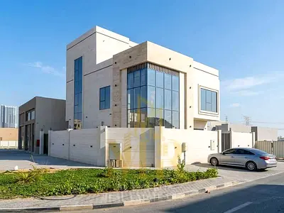 Includes electricity, water, air conditioning, and swimming pool | 5-master-bedroom, 3-story villa in Ajman – Freehold