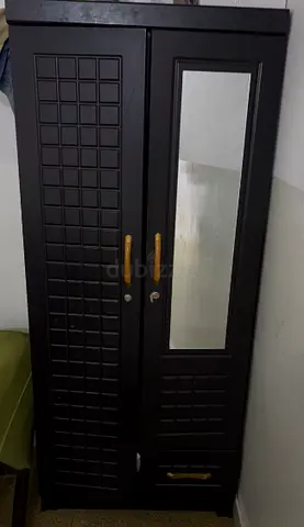 Dark wooden two-door wardrobe with mirror and drawers - good condition