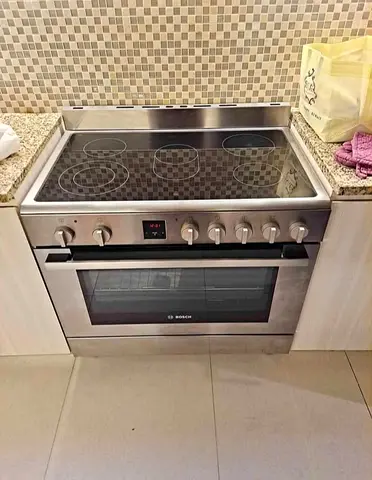 Bosch electric cooker 90 by 60 cm latest model like new condition perfect
