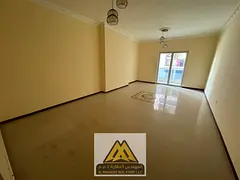 2BR in Al Nuaimiya 3, central AC, balcony and free parking. AED 44,001 yearly, 4 payments.