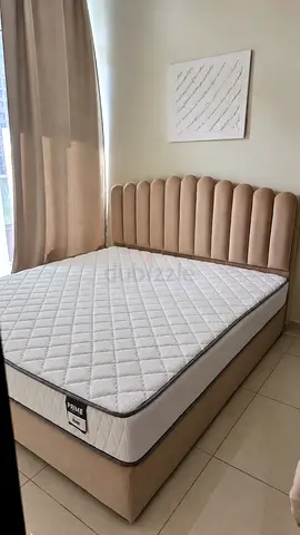 New upholstered King bed and mattress