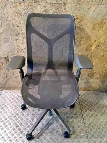 Herman Miller Gray ergonomic mesh office chair with adjustable armrests