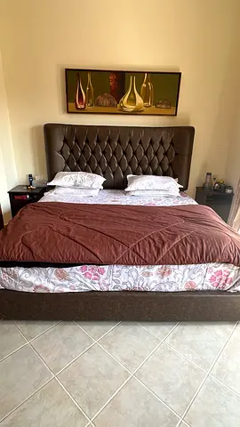 King size upholstered bed with tufted headboard - good condition