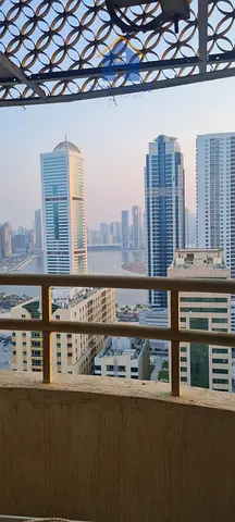 Three-bedroom apartment with parking for sale in Al Majaz 3.
