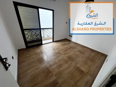 One-bedroom apartment (with living room) for annual rent in Al Rawda 3, Ajman – AED 25,000 – Balcony with an excellent view – Split air conditioning –