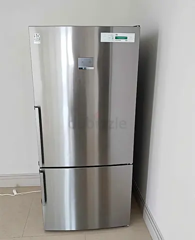 Stainless steel bottom-freezer refrigerator - good condition