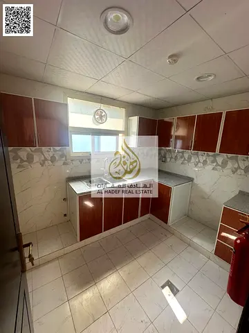 Apartment for rent in Ajman: 1 bedroom + living room, first-time occupancy. Located in Al Bustan, o
