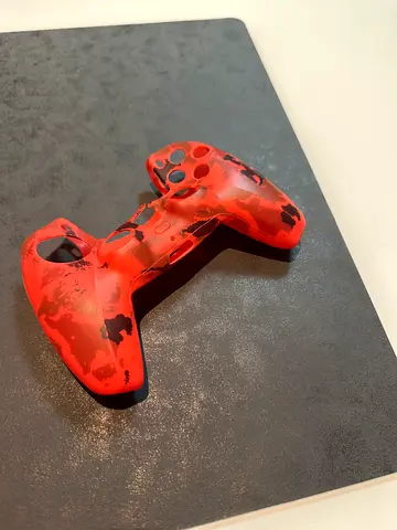 Red camo silicone cover for DualShock controller - used
