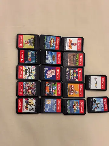 Lot of 21 Nintendo Switch game cartridges — mixed titles, working condition