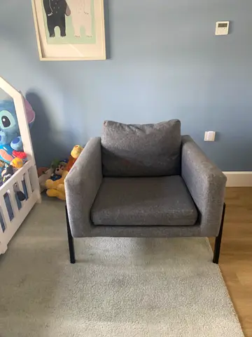 Grey fabric armchair — compact single seater, great condition.