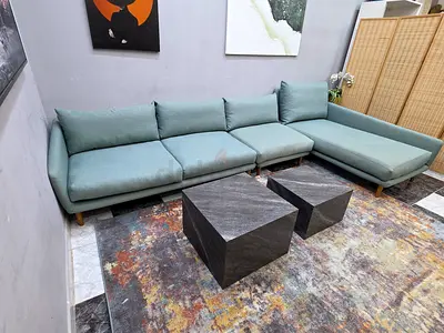 Light green L-shaped fabric sofa with chaise - good condition
