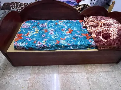 Solid wood single daybed with storage - good condition