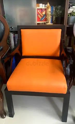 Solid wood armchair with orange upholstery - sturdy and stylish