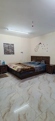 Used wooden double bed with two bedside tables - good condition