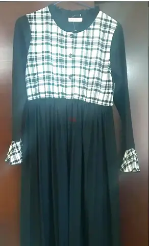 Black long-sleeve dress with plaid bodice and cuff details - Medium