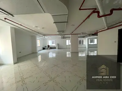 Mezzanine level, first-time occupancy. Area: 5,000 square feet. Features a private entrance, 3 restrooms, and a kitchen. Spacious, divisible layout wi