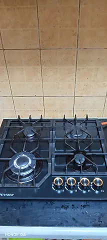4-Burner Gas stove — Black, glass top minimal Used, perfect Working, under warranty.