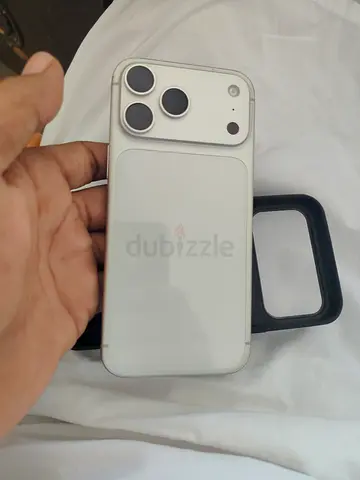 iPhone-style white smartphone with magnetic camera covers - used