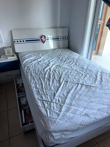 Single bed with headboard and storage shelves - good condition