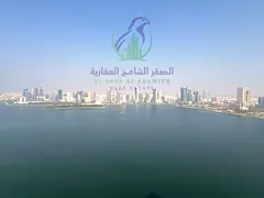 Annual 3 bedroom apartment for rent in Al Majaz 3 Sharjah free parking direct sea view wardrobes bal