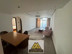 2BR in Al Nuaimiya 3, near Carrefour & Grand Mall. Balcony, central AC, free parking. AED 50K negoti
