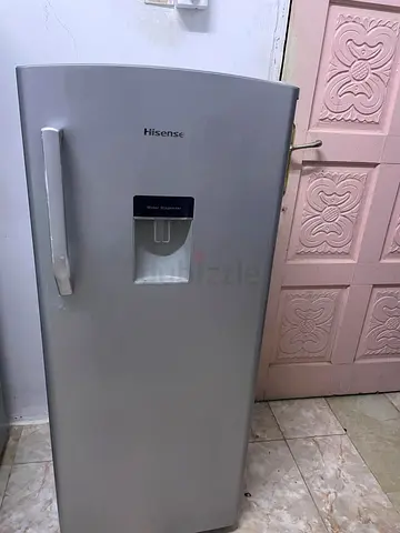 Hisense single-door refrigerator with water dispenser - good condition