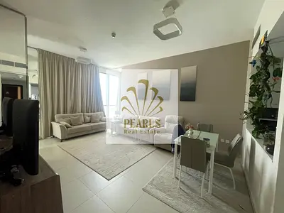 For rent in Ajmal Makan, Al Hamriyah: furnished 1-bedroom apartment with open sea view, master bedroom, large balcony, central AC, private parking, an