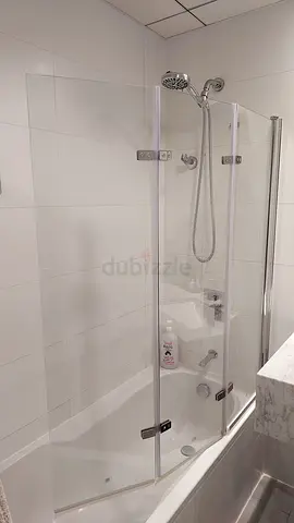 Glass Shower Enclosure with Sliding Doors and Handheld Shower