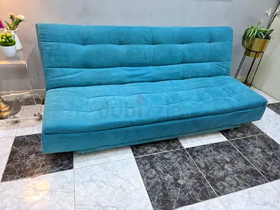 Blue fabric sofa bed - good condition, convertible