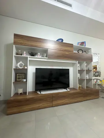 Modern wooden entertainment TV unit with storage shelves