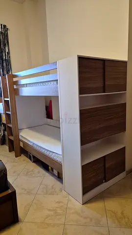 Bunk bed with the book storage and two mattresses