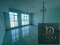 Two-bedroom apartment with a living room and a prime view, located in the front row along the Ajman 