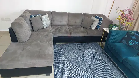 L shaped,Gray and black Pan home Sofa is on sale