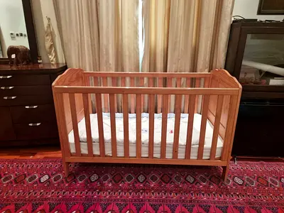 Solid Wood Baby Crib and mattress Natural Finish, Good Condition