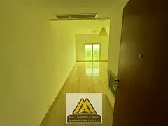 2BR in Al Nuaimiya 3, near Carrefour & Grand Mall. Balcony, central AC, free parking. AED 43K negoti