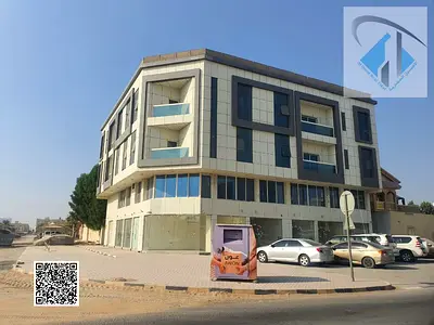 Residential-commercial building for sale in Al Muwaihat, Ajman; corner location, good position.