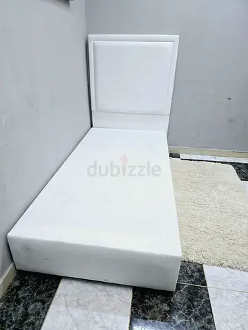 Single white upholstered bed with mattress with headboard - good condition