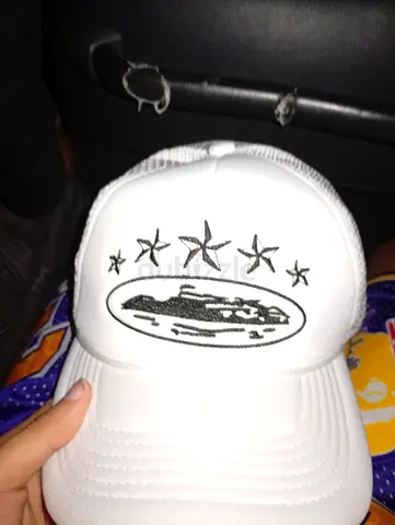 White trucker cap with star and emblem - gently used